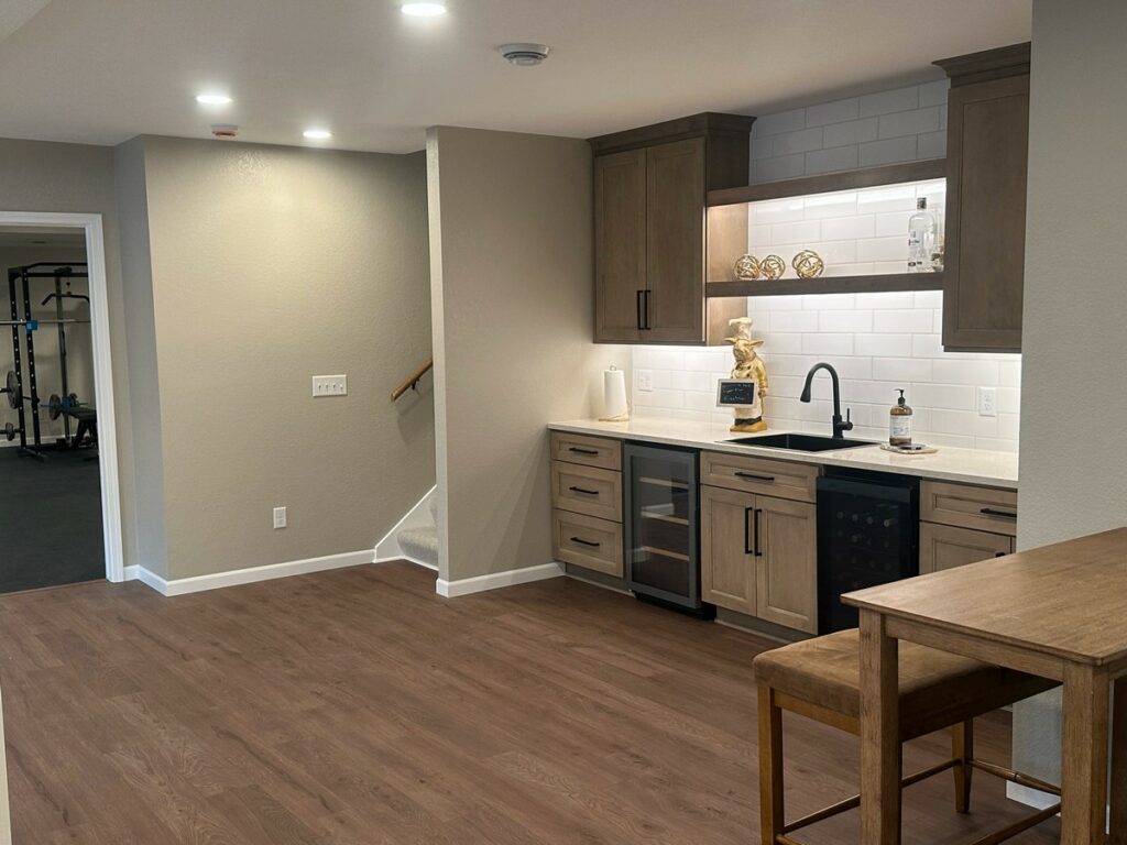 Hartland Complete Basement Remodel: Custom Home Gym, Office & Entertainment Center