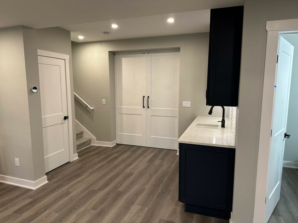 Waukesha Basement Remodel: Custom Rec Room, Wet Bar & Powder Room Upgrade