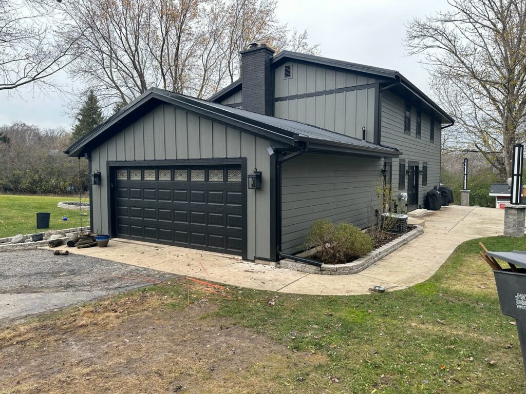 Mukwonago Exterior Makeover: LP Smartside Siding, Standing Seam Roof & Pella Window Upgrade