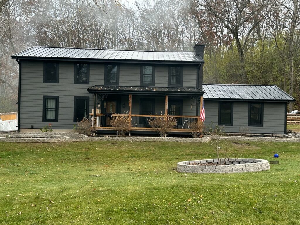 Mukwonago Exterior Makeover: LP Smartside Siding, Standing Seam Roof & Pella Window Upgrade
