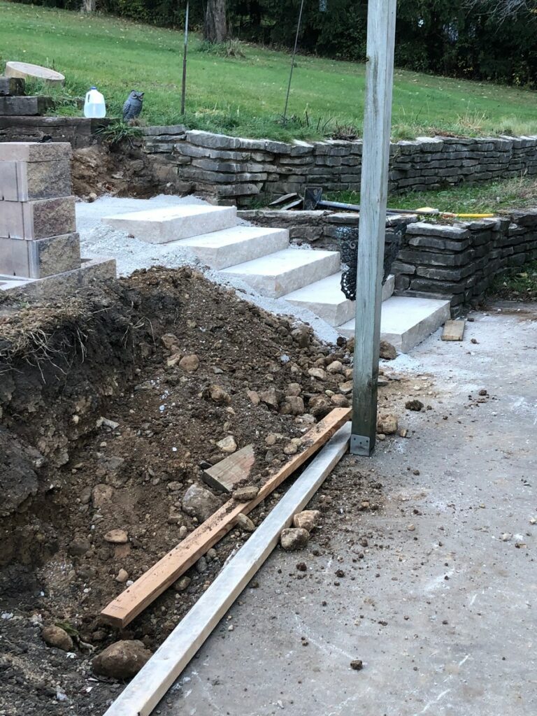 Pewaukee Two-Tier Retaining Wall & Stone Step Installation for Pool Deck